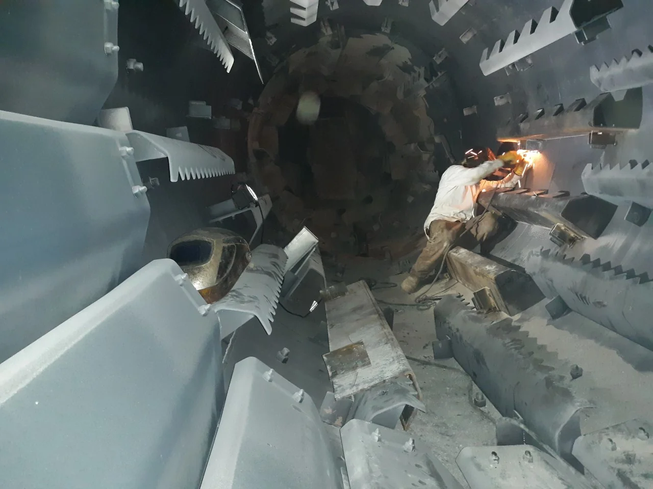 Heavy equipment welding with sparks