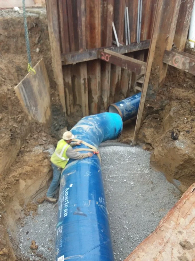 Blue water main welded in trench